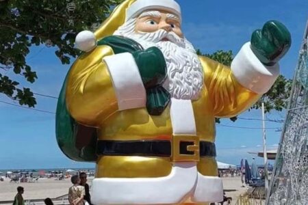 Balneário Camboriú troca traje vermelho do Papai Noel pelo verde e amarelo